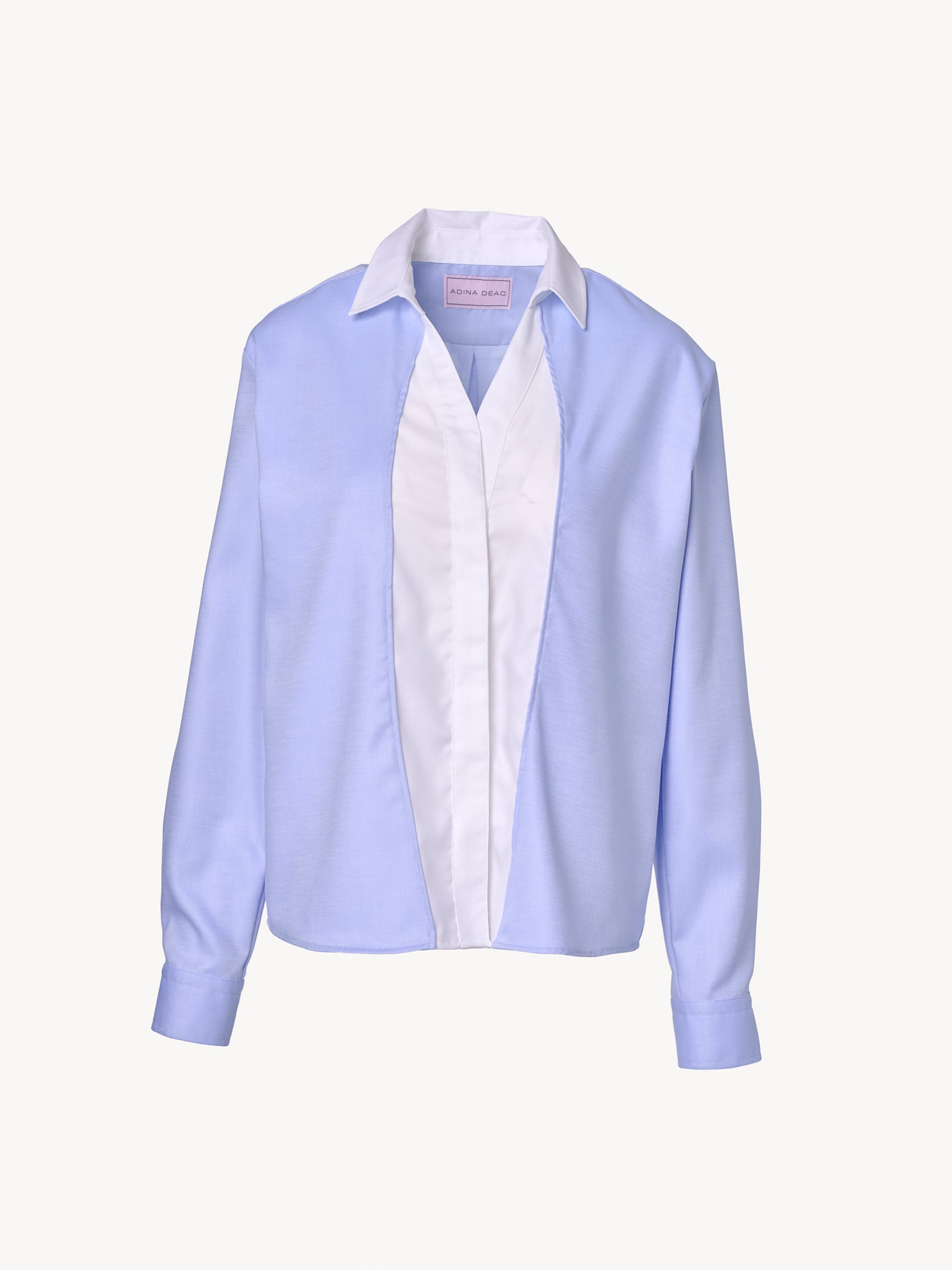 Contemporary white and blue cotton shirt with structured silhouette and asymmetric construction