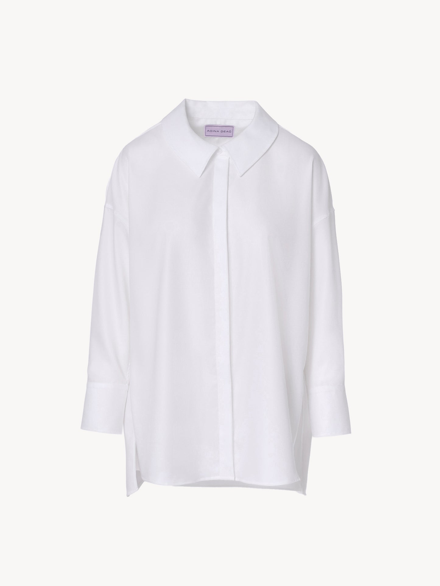 Modern oversized collar white shirt with clean lines and asymmetric detailing