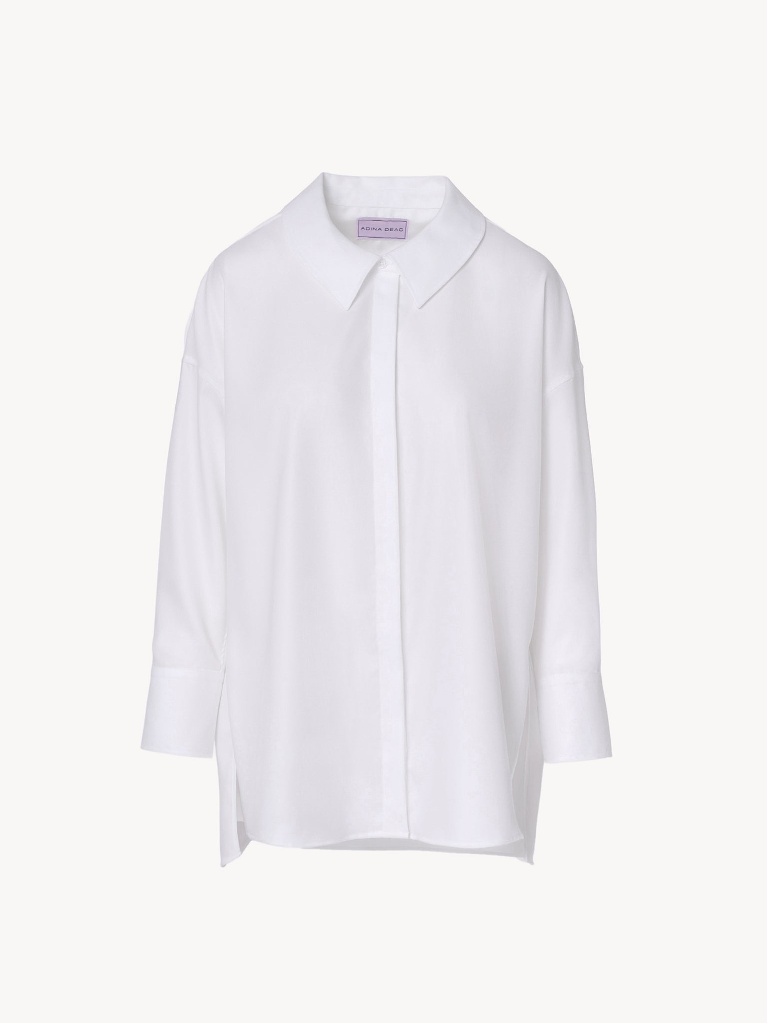 Modern oversized collar white shirt with clean lines and asymmetric detailing